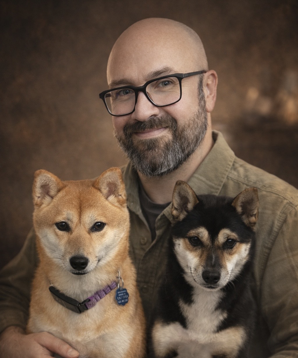 Michael with Shibas